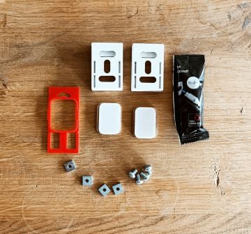 Fixation à coller pour installer stores sans percer