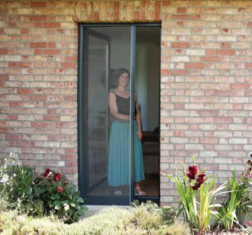 Zanzariera a rullo orizzontale per porta & balcone