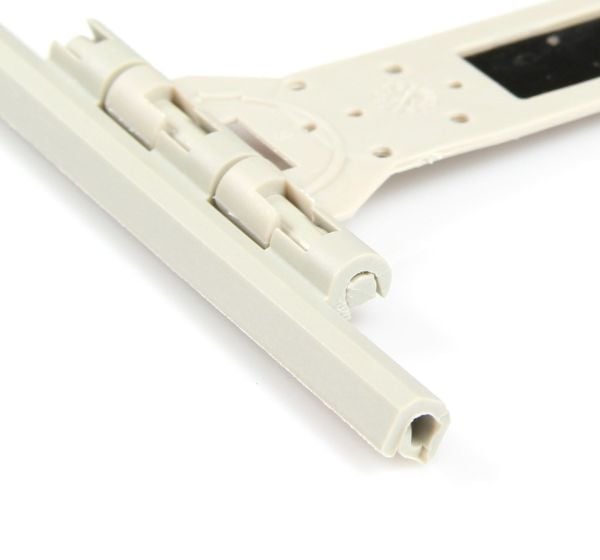 Adjuntar delantal flexible en forma de T