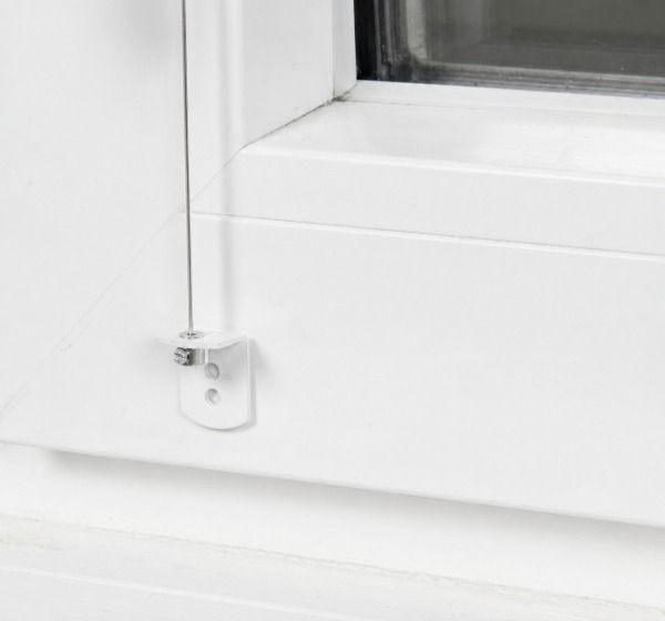 Fixation basse pour guidages latéraux